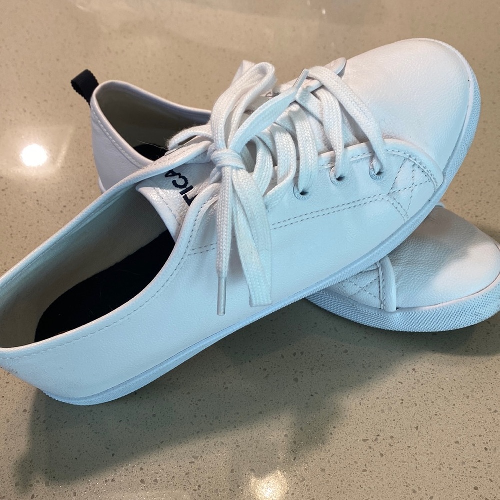 White faux leather tennis shoes